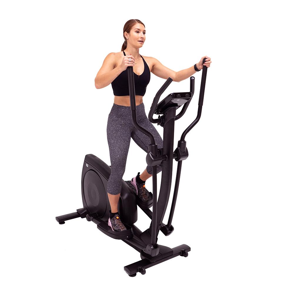 freeform e3 elliptical trainer side view with woman