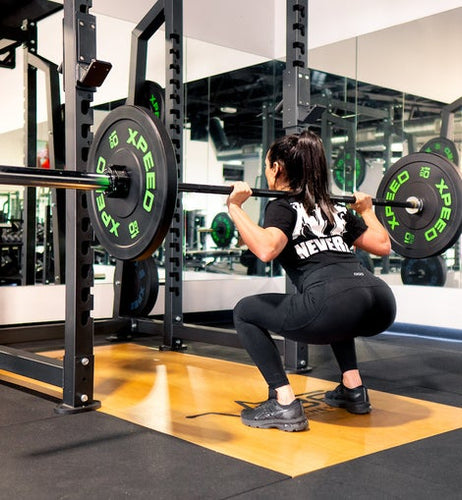 Load image into Gallery viewer, Ffittech Power Cage front view with woman in squat
