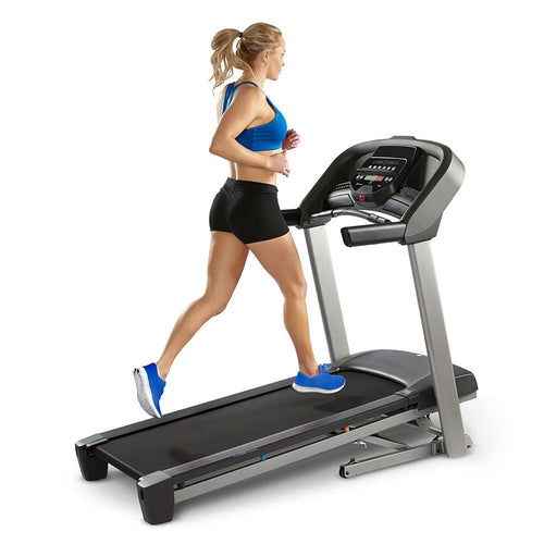 Load image into Gallery viewer, horizon t101 treadmill side view with woman
