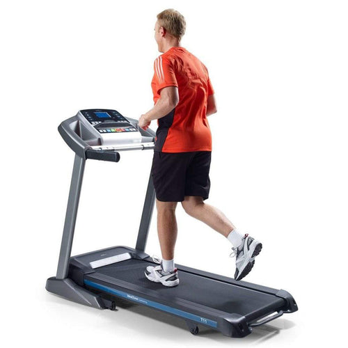 Load image into Gallery viewer, tempo t11 treadmill side view with man
