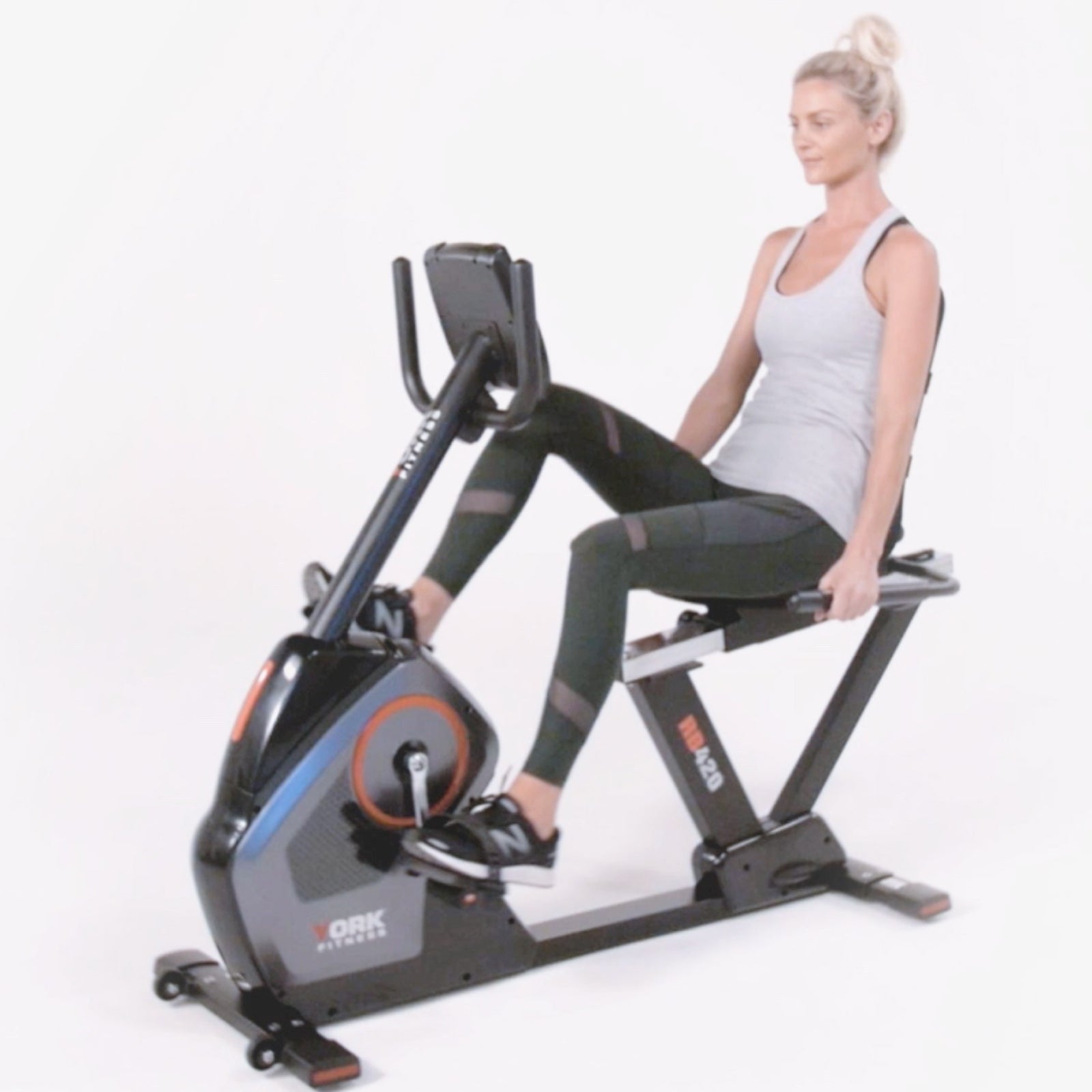 york rb420 recumbent bike side view with woman