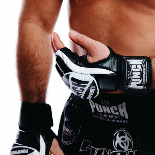 Load image into Gallery viewer, Punch MMA Pre-Curved Boxing Mitts close up while in use by man
