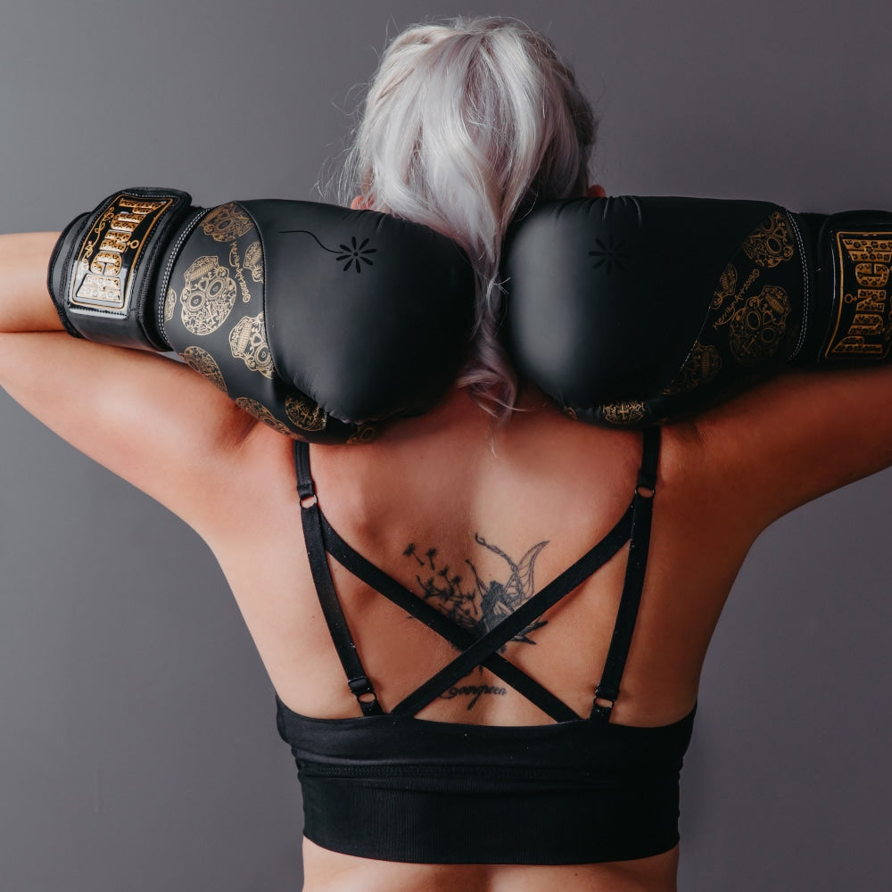 Punch Urban Cobra Boxing Gloves black front view while worn by woman