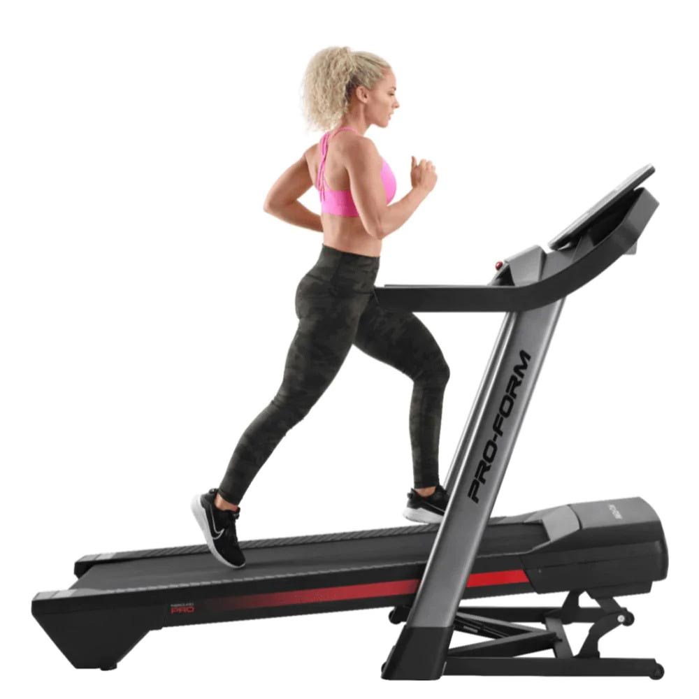 Proform Pro 2000 Treadmill side view incline used by woman