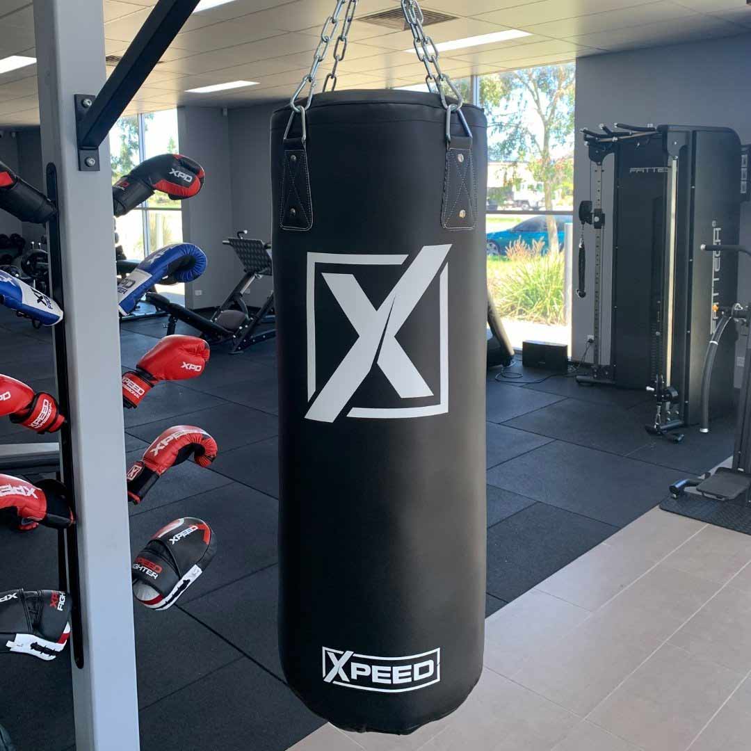 Xpeed New Contender Boxing Bag front view in gym